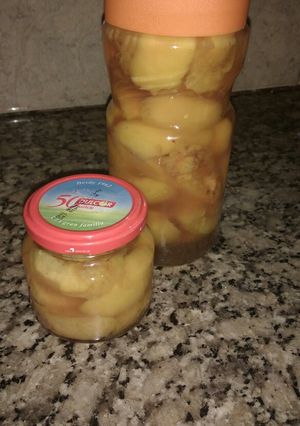 Una foto de Duraznos en almíbar