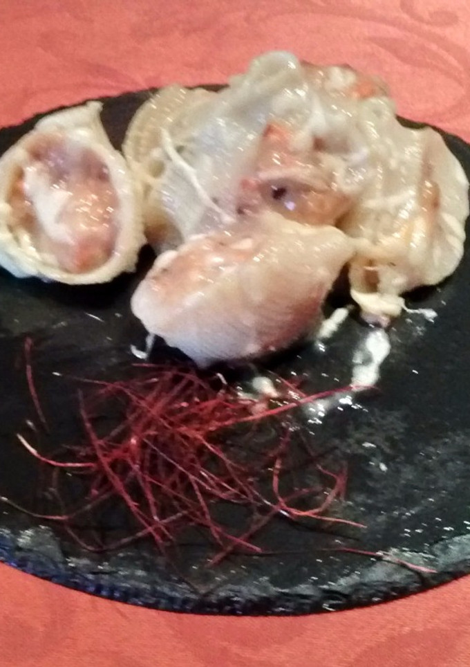 Una foto de Codillos de pasta rellenos de mejillones