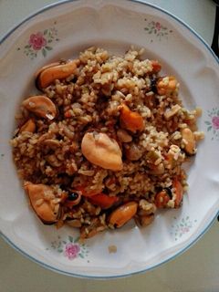 Una foto de Mejillones con arroz integral