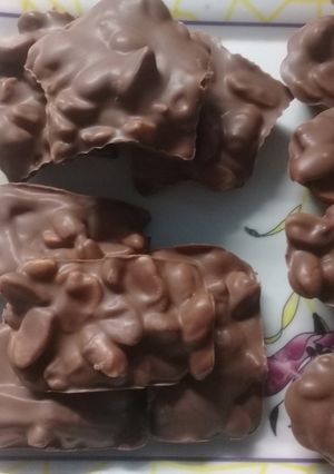 Una foto de Chocolate con maní (tipo shot)