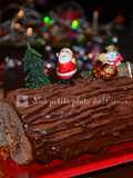 Bûche de Noël au chocolat, poire et chouchous