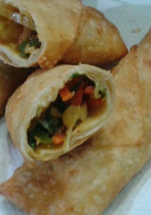 A picture of Chicken tikka spring rolls.