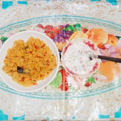 A picture of Biriyani Semolina Or Rava Upma With Onion Curd Chutney(Raitha).