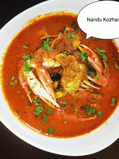 A picture of Nandu kozhambu crab curry.