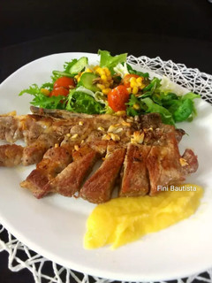 Una foto de Chuletas de cerdo con salsa de mango