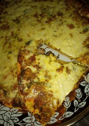 صورة لوصفة بيتزا 🍕 ببديل الجبنة