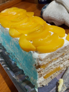 Una foto de Torta de tres leches con duraznos (de galletas)