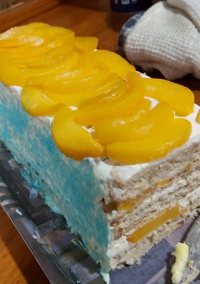 Una foto de Torta de tres leches con duraznos (de galletas)