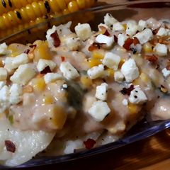 A picture of Italian panner ravioli with pink sauce.