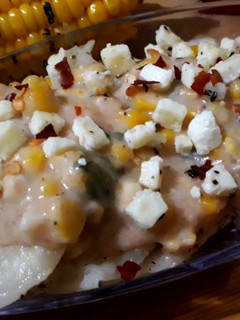 A picture of Italian panner ravioli with pink sauce.