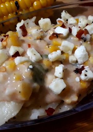 A picture of Italian panner ravioli with pink sauce.