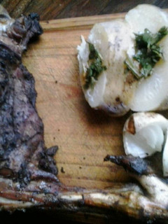 Una foto de Cabrito a leña