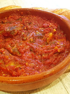 Una foto de Bacalao con tomate. Receta tradicional