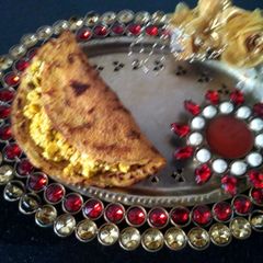 A picture of #Besan Ka Chilla with paneer stuffing.