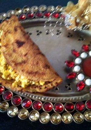 A picture of #Besan Ka Chilla with paneer stuffing.