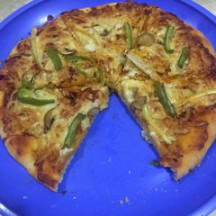 Restaurant style homemade pizza A picture of Restaurant style homemade pizza.