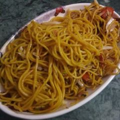 A picture of Veg noddles with Indian spices.