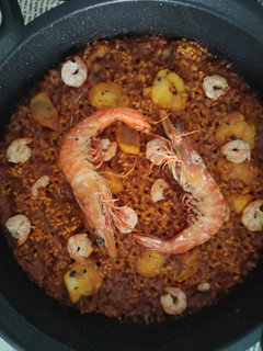 Una foto de Arroz con Rape y Langostino Tigre a la Paella Terminado en el Horno