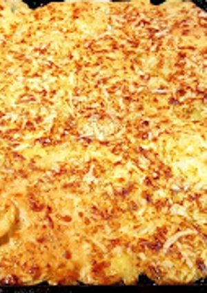 Una foto de Patatas con bechamel gratinadas