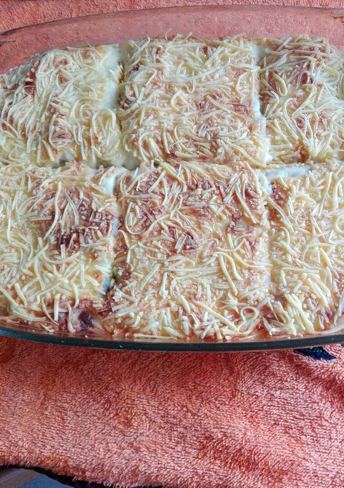 Una foto de Lasaña con brócoli y pasas