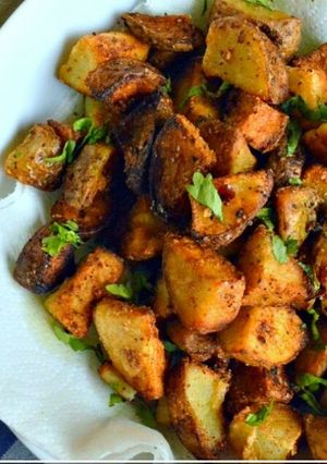 صورة لوصفة بطاطا حاره بالثوم والاعشاب 😋