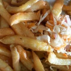 A picture of Fries with Salad.