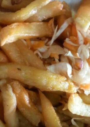 A picture of Fries with Salad.