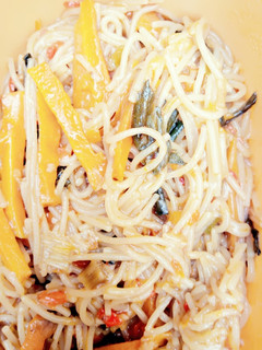 A picture of Jallop spaghetti with carrot.