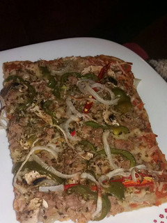 Una foto de Pizza