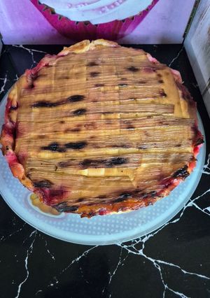 Une photo de Tarte au flan rhubarbe framboises