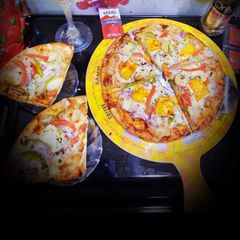 A picture of Tangy Paneer Pizza.