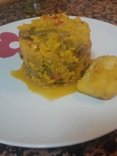 Una foto de Arroz y verduras con bacalao