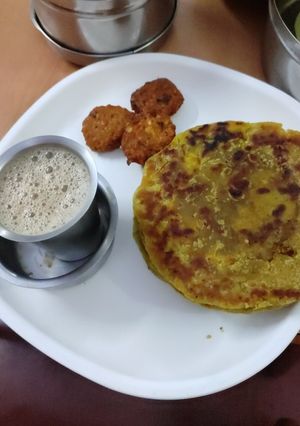 A picture of Bogi festival puran poli(sweet) Dal vada, coffee.