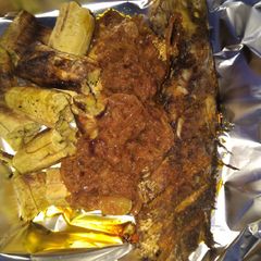 A picture of Grilled croaker and bole (roasted plantain).