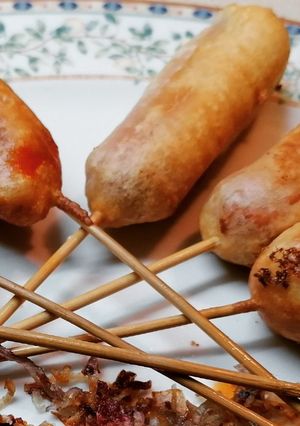 Una foto de Corn dog "frankfurts envueltos"