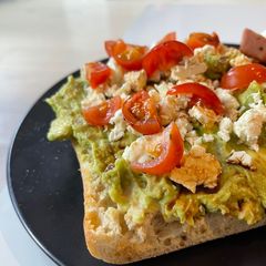 A picture of Smash Avocado on Ciabatta.