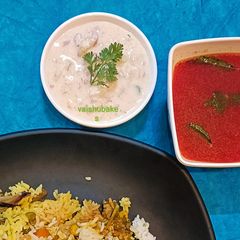 A picture of Cucumber and Onion Raita for Biryani.