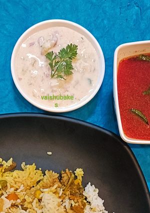 A picture of Cucumber and Onion Raita for Biryani.