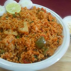 A picture of Tomato Masala Pulao.