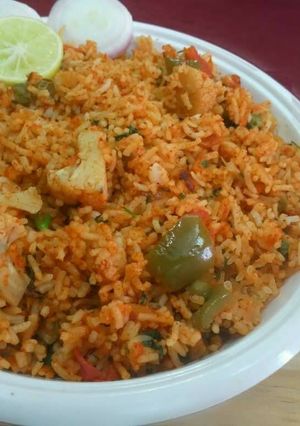 A picture of Tomato Masala Pulao.