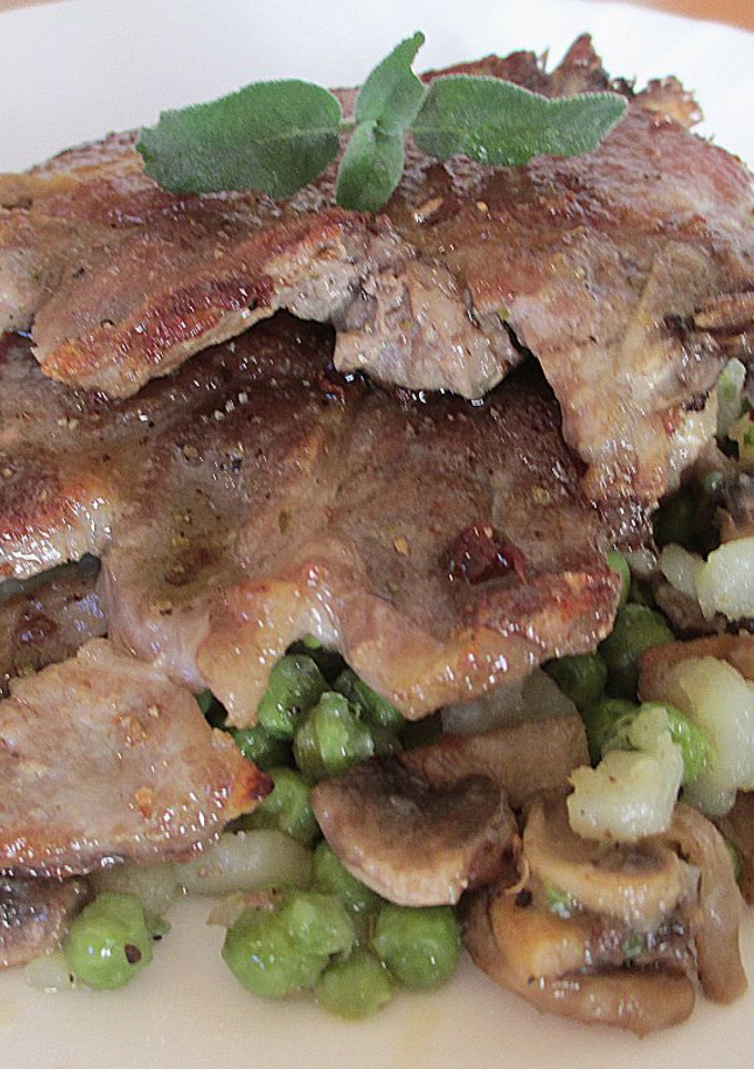 Una foto de Carne de cerdo con guisantes