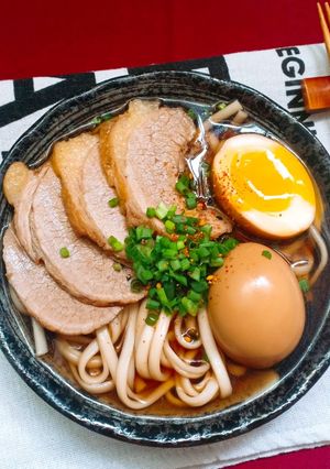 A picture of Beef Udon Noodle Soup with Soy Sauce Broth.