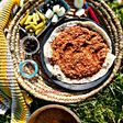 برغل على بندورة بالقاورما على الحطب
