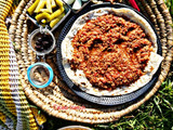 برغل على بندورة بالقاورما على الحطب