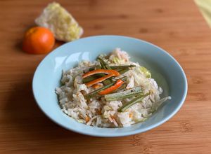 Foto di Pilaf di scorze di clementina, gambi di carciofo e julienne di iceberg