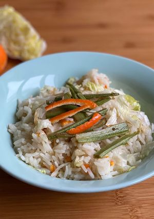 Foto di Pilaf di scorze di clementina, gambi di carciofo e julienne di iceberg