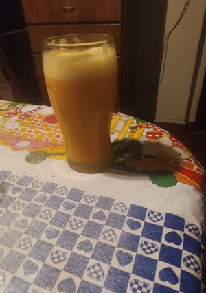 Una foto de Jugo de mandarina y naranja