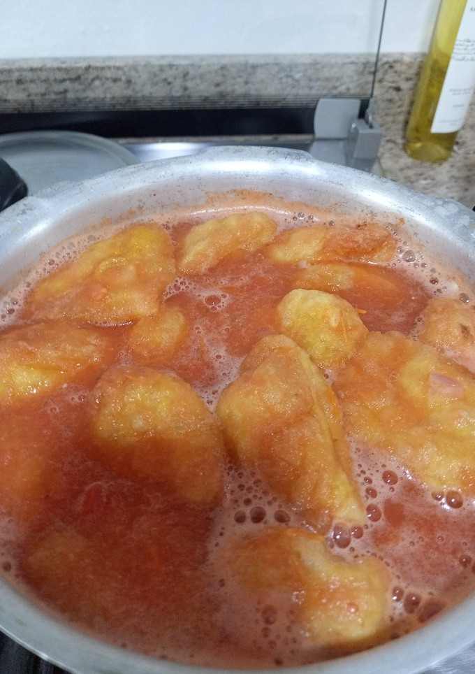 Una foto de Coliflor forrada en salsa roja🍅🍅🍅