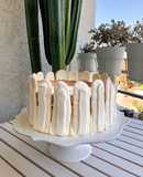 Torta merengue, crema y manjar