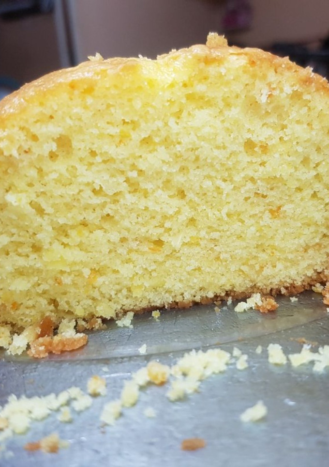 Una foto de Budín de mandarina 🍊🧡